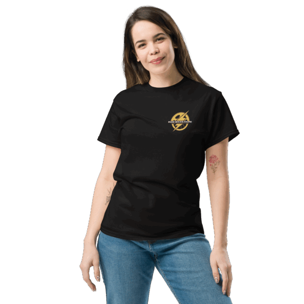 Female model wearing Ride Bikes More Slipstream tee with front gold lightning logo.